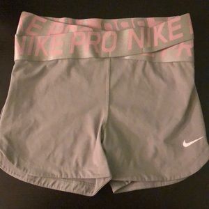 Grey nike spandex with pink letters